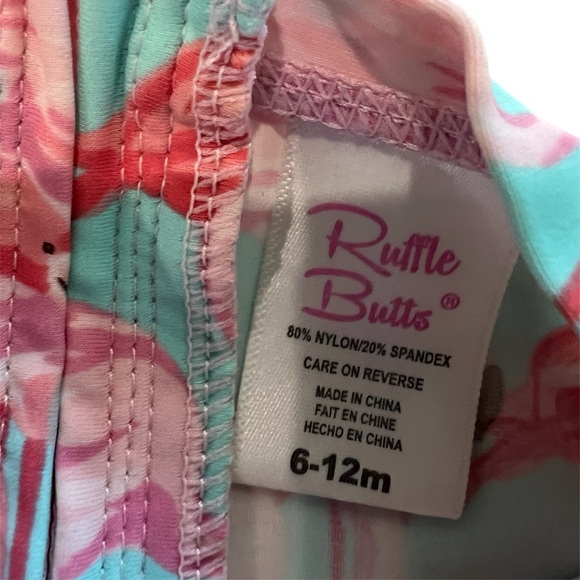Ruffle Butts Fab Flamingo One Piece Rash Guard Swimsuit UPF 50+
6-12M - Picture 6 of 6